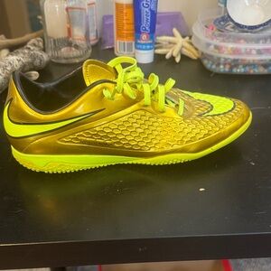 Nike men’s gold sneakers
